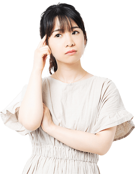 悩んでいる女性の写真